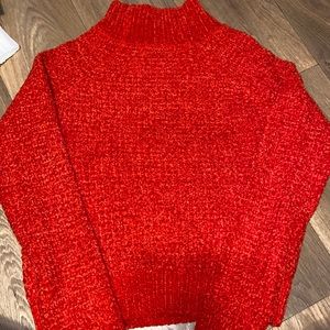 Red cropped turtleneck sweater